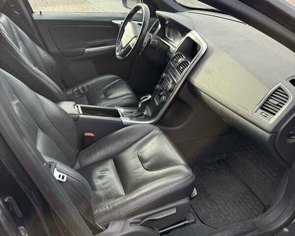 Черный Вольво ХС60, объемом двигателя 2.4 л и пробегом 190 тыс. км за 16500 $, фото 4 на Automoto.ua