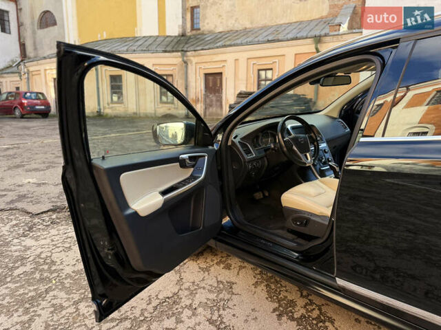 Черный Вольво ХС60, объемом двигателя 2.4 л и пробегом 234 тыс. км за 18799 $, фото 112 на Automoto.ua