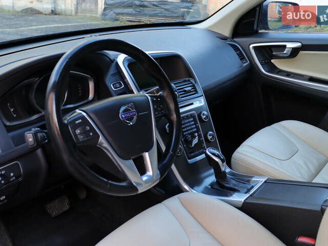 Черный Вольво ХС60, объемом двигателя 2.4 л и пробегом 234 тыс. км за 18799 $, фото 160 на Automoto.ua