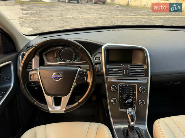 Черный Вольво ХС60, объемом двигателя 2.4 л и пробегом 234 тыс. км за 18799 $, фото 135 на Automoto.ua