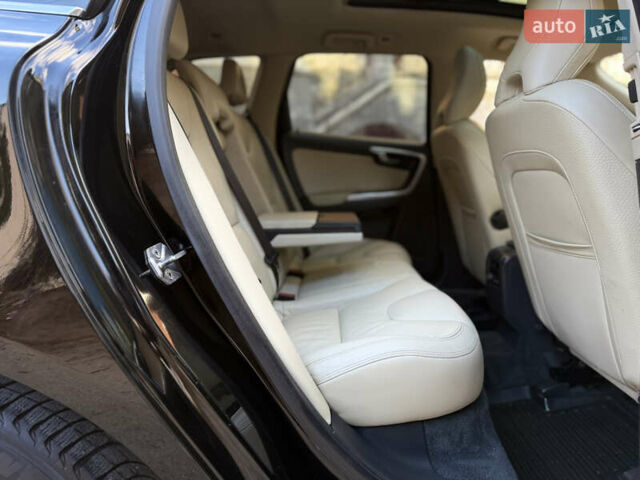 Черный Вольво ХС60, объемом двигателя 2.4 л и пробегом 234 тыс. км за 18799 $, фото 148 на Automoto.ua