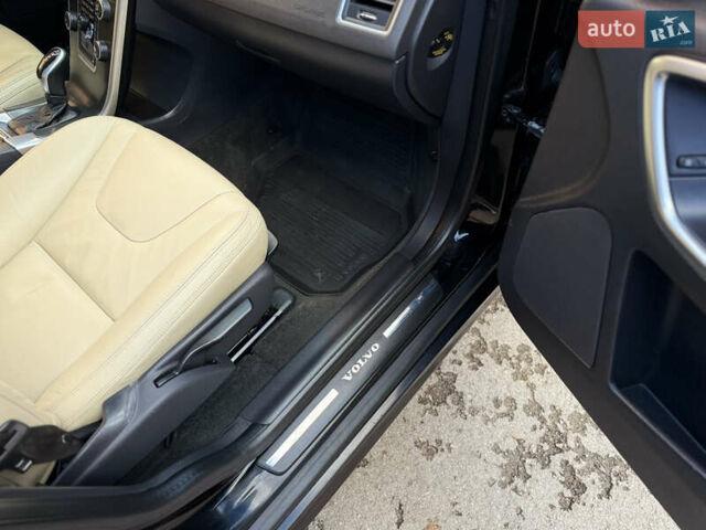 Черный Вольво ХС60, объемом двигателя 2.4 л и пробегом 234 тыс. км за 18799 $, фото 111 на Automoto.ua