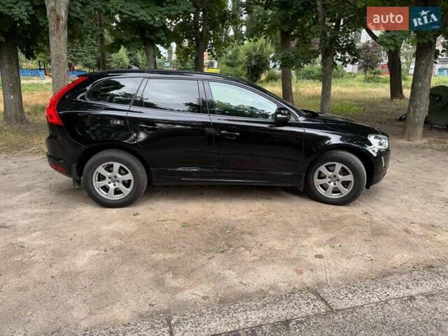 Черный Вольво ХС60, объемом двигателя 2 л и пробегом 284 тыс. км за 16990 $, фото 1 на Automoto.ua
