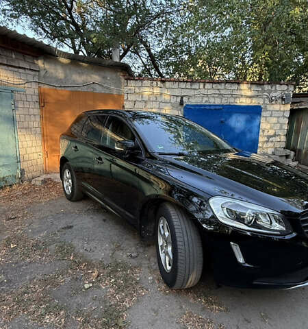 Черный Вольво ХС60, объемом двигателя 2 л и пробегом 217 тыс. км за 22400 $, фото 1 на Automoto.ua