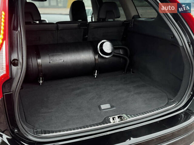 Чорний Вольво ХС60, об'ємом двигуна 2.5 л та пробігом 160 тис. км за 16300 $, фото 13 на Automoto.ua