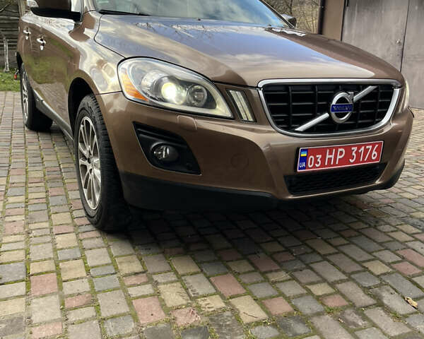 Коричневый Вольво ХС60, объемом двигателя 2.4 л и пробегом 197 тыс. км за 12777 $, фото 1 на Automoto.ua