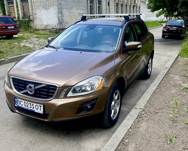 Коричневий Вольво ХС60, об'ємом двигуна 2.4 л та пробігом 325 тис. км за 10999 $, фото 1 на Automoto.ua