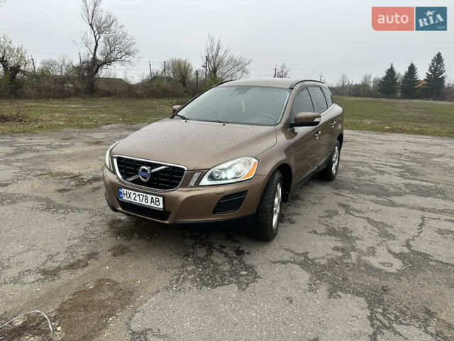 Коричневый Вольво ХС60, объемом двигателя 2.4 л и пробегом 302 тыс. км за 12900 $, фото 1 на Automoto.ua