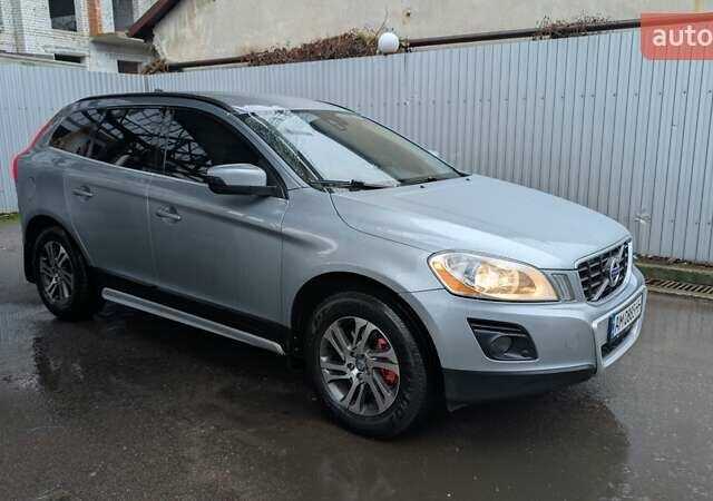 Серый Вольво ХС60, объемом двигателя 2.4 л и пробегом 278 тыс. км за 12300 $, фото 1 на Automoto.ua