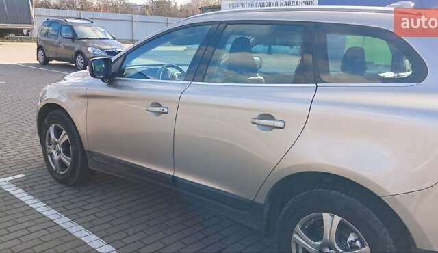 Серый Вольво ХС60, объемом двигателя 2.4 л и пробегом 285 тыс. км за 14950 $, фото 5 на Automoto.ua