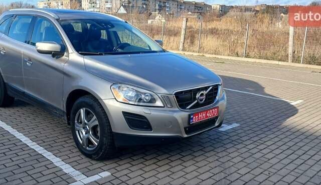 Серый Вольво ХС60, объемом двигателя 2.4 л и пробегом 285 тыс. км за 14950 $, фото 3 на Automoto.ua