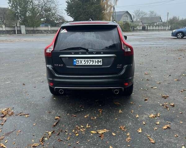 Вольво ХС60 2014 в Полонном на Automoto.ua Серый Вольво ХС60, объемом двигателя 2.4 л и пробегом 319 тыс. км за 16344 $, фото 7 на Automoto.ua
