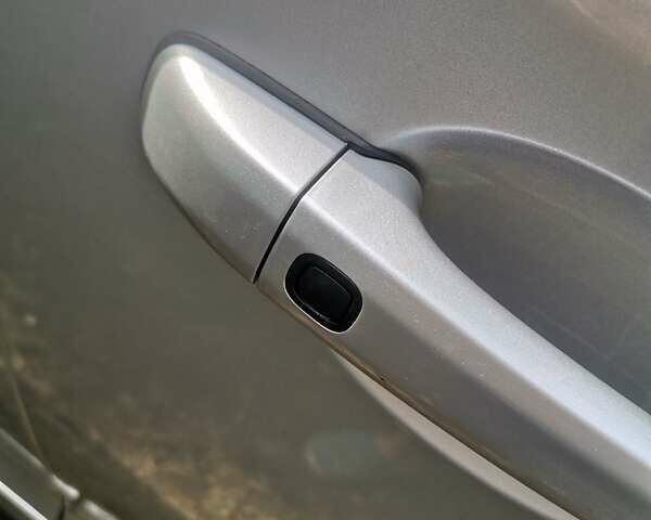 Сірий Вольво ХС60, об'ємом двигуна 2 л та пробігом 195 тис. км за 14000 $, фото 4 на Automoto.ua