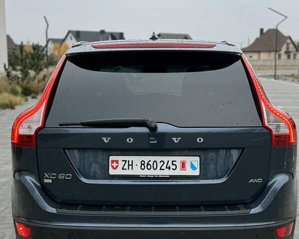 Синий Вольво ХС60, объемом двигателя 2.4 л и пробегом 240 тыс. км за 12800 $, фото 5 на Automoto.ua