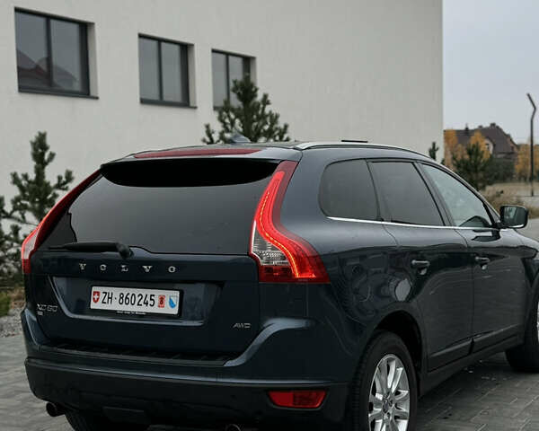 Синий Вольво ХС60, объемом двигателя 2.4 л и пробегом 240 тыс. км за 12800 $, фото 4 на Automoto.ua