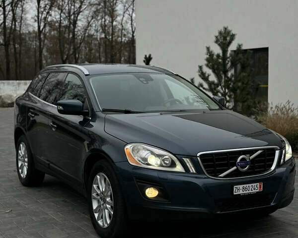 Синий Вольво ХС60, объемом двигателя 2.4 л и пробегом 240 тыс. км за 12800 $, фото 2 на Automoto.ua