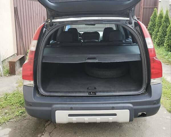 Чорний Вольво ХС70, об'ємом двигуна 2.5 л та пробігом 247 тис. км за 11111 $, фото 1 на Automoto.ua