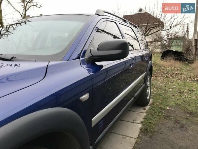 Синий Вольво ХС70, объемом двигателя 2.4 л и пробегом 220 тыс. км за 10000 $, фото 4 на Automoto.ua