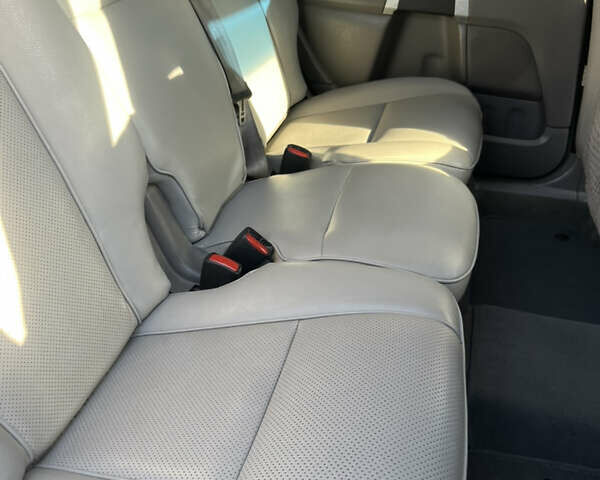 Белый Вольво ХС90, объемом двигателя 2.4 л и пробегом 375 тыс. км за 12500 $, фото 4 на Automoto.ua