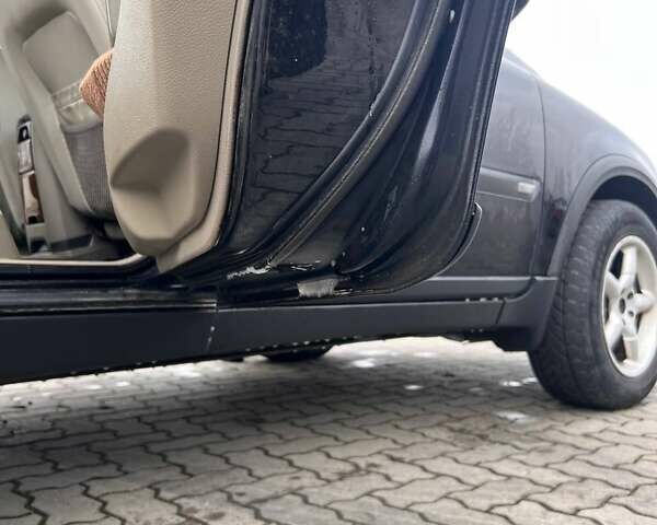 Черный Вольво ХС90, объемом двигателя 2.4 л и пробегом 282 тыс. км за 5600 $, фото 5 на Automoto.ua