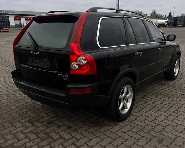 Черный Вольво ХС90, объемом двигателя 2.4 л и пробегом 282 тыс. км за 5600 $, фото 2 на Automoto.ua