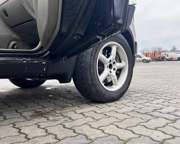 Черный Вольво ХС90, объемом двигателя 2.4 л и пробегом 282 тыс. км за 5600 $, фото 4 на Automoto.ua