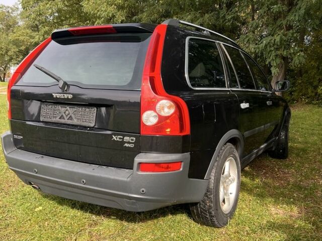 Черный Вольво ХС90, объемом двигателя 2.4 л и пробегом 280 тыс. км за 6100 $, фото 1 на Automoto.ua