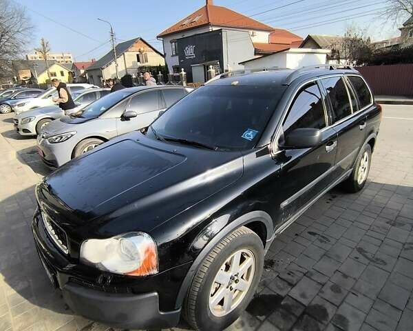 Черный Вольво ХС90, объемом двигателя 2.4 л и пробегом 365 тыс. км за 8000 $, фото 1 на Automoto.ua