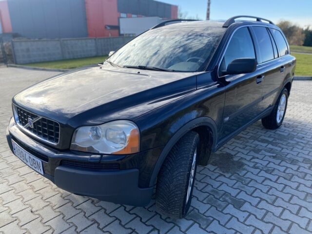 Черный Вольво ХС90, объемом двигателя 2.4 л и пробегом 322 тыс. км за 5550 $, фото 1 на Automoto.ua