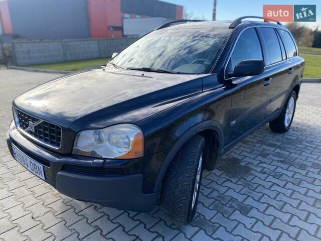 Черный Вольво ХС90, объемом двигателя 2.4 л и пробегом 322 тыс. км за 5550 $, фото 1 на Automoto.ua
