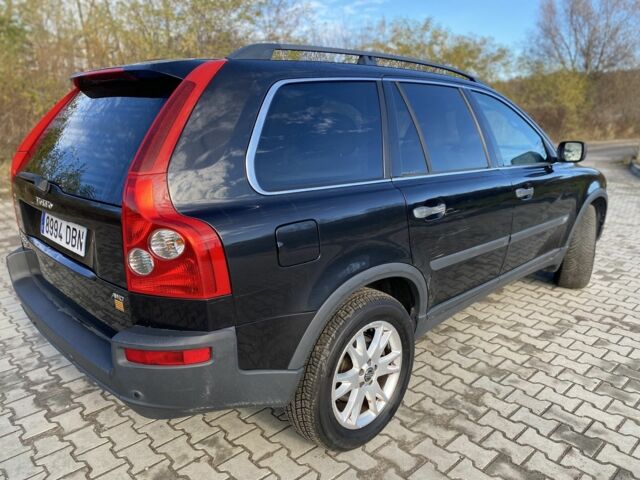 Черный Вольво ХС90, объемом двигателя 2.4 л и пробегом 322 тыс. км за 5550 $, фото 2 на Automoto.ua