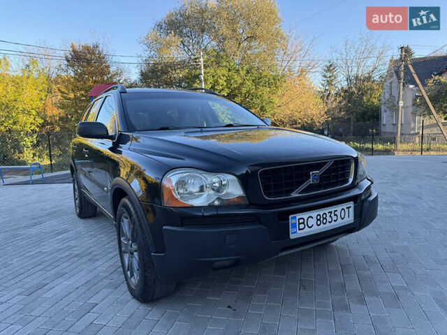 Черный Вольво ХС90, объемом двигателя 2.4 л и пробегом 570 тыс. км за 7999 $, фото 1 на Automoto.ua