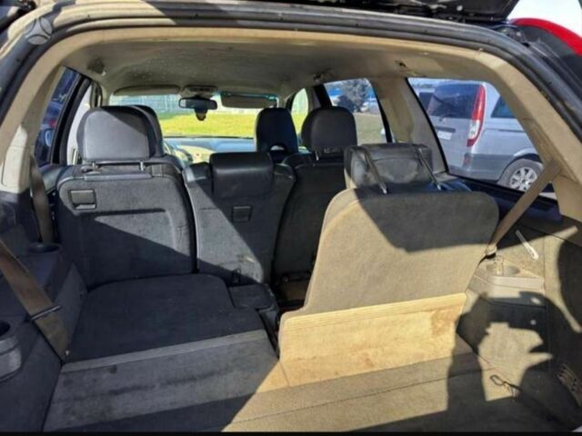 Черный Вольво ХС90, объемом двигателя 2.4 л и пробегом 290 тыс. км за 4900 $, фото 5 на Automoto.ua