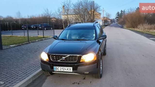 Черный Вольво ХС90, объемом двигателя 2.4 л и пробегом 325 тыс. км за 10500 $, фото 1 на Automoto.ua