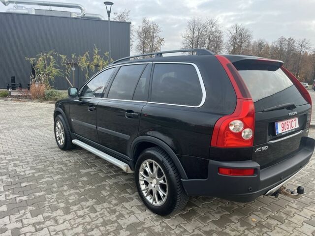 Чорний Вольво ХС90, об'ємом двигуна 2.4 л та пробігом 300 тис. км за 5600 $, фото 1 на Automoto.ua
