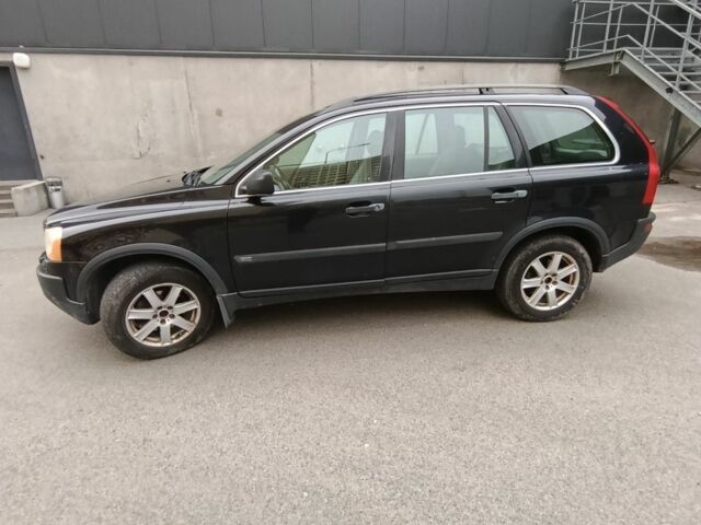 Черный Вольво ХС90, объемом двигателя 2.4 л и пробегом 379 тыс. км за 4800 $, фото 1 на Automoto.ua