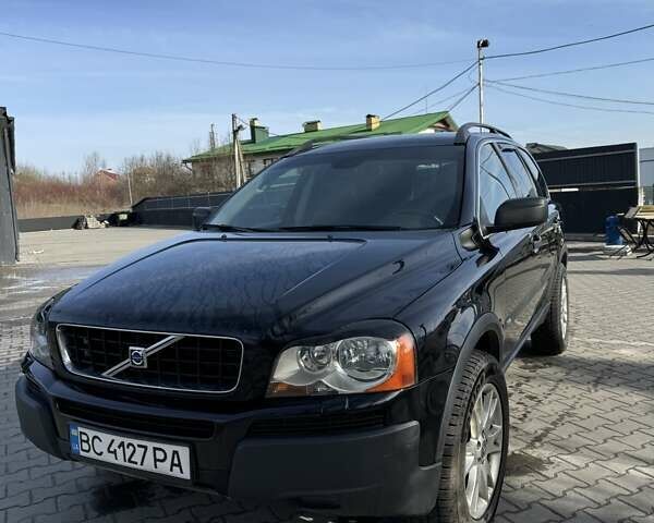 Черный Вольво ХС90, объемом двигателя 2.4 л и пробегом 285 тыс. км за 11200 $, фото 3 на Automoto.ua