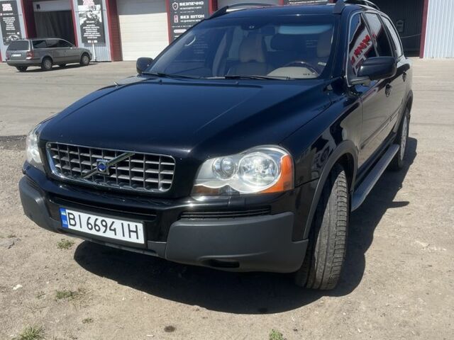 Черный Вольво ХС90, объемом двигателя 2.4 л и пробегом 319 тыс. км за 6900 $, фото 1 на Automoto.ua