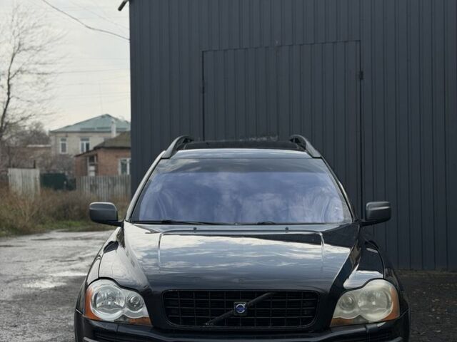 Черный Вольво ХС90, объемом двигателя 2.4 л и пробегом 300 тыс. км за 6150 $, фото 1 на Automoto.ua