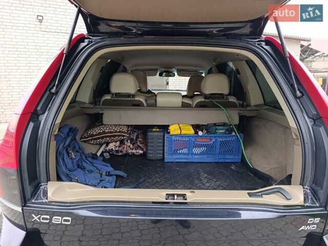 Черный Вольво ХС90, объемом двигателя 2.4 л и пробегом 317 тыс. км за 11900 $, фото 1 на Automoto.ua