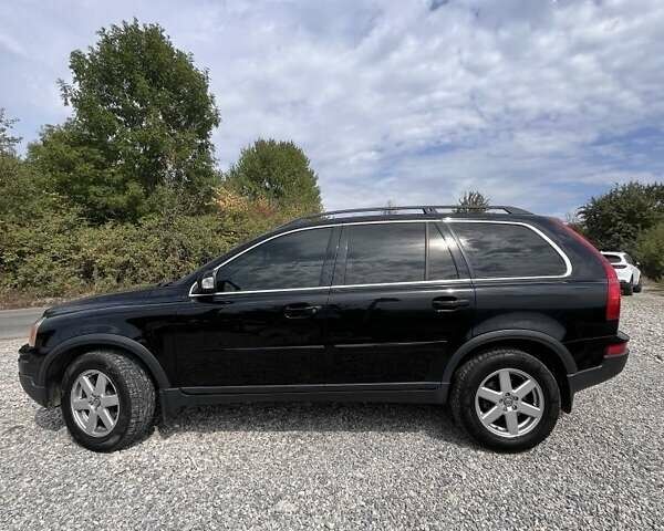 Черный Вольво ХС90, объемом двигателя 2.4 л и пробегом 300 тыс. км за 12000 $, фото 1 на Automoto.ua