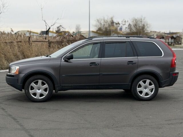 Коричневый Вольво ХС90, объемом двигателя 2.4 л и пробегом 380 тыс. км за 6100 $, фото 1 на Automoto.ua