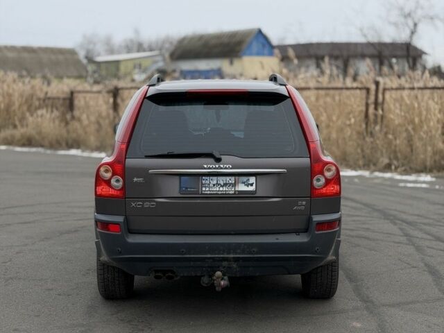 Коричневый Вольво ХС90, объемом двигателя 2.4 л и пробегом 380 тыс. км за 6100 $, фото 3 на Automoto.ua