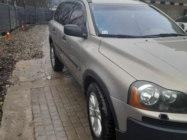 Серый Вольво ХС90, объемом двигателя 2.4 л и пробегом 350 тыс. км за 5292 $, фото 2 на Automoto.ua