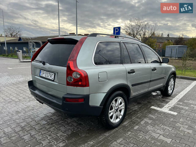 Серый Вольво ХС90, объемом двигателя 2.4 л и пробегом 250 тыс. км за 4200 $, фото 3 на Automoto.ua
