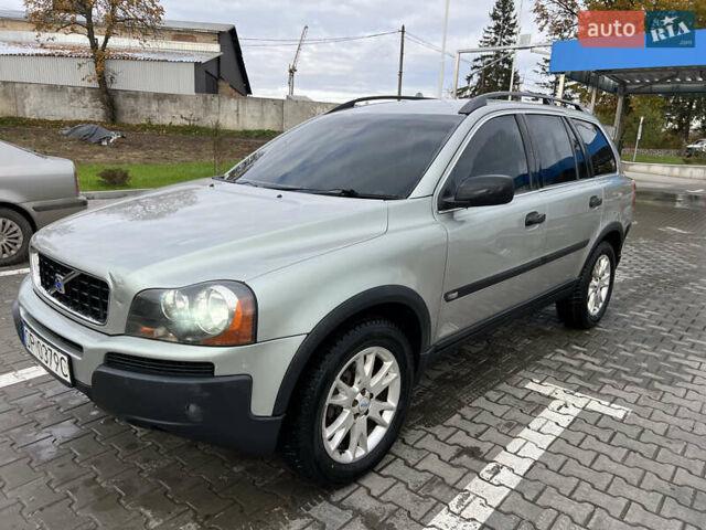 Серый Вольво ХС90, объемом двигателя 2.4 л и пробегом 250 тыс. км за 4200 $, фото 1 на Automoto.ua