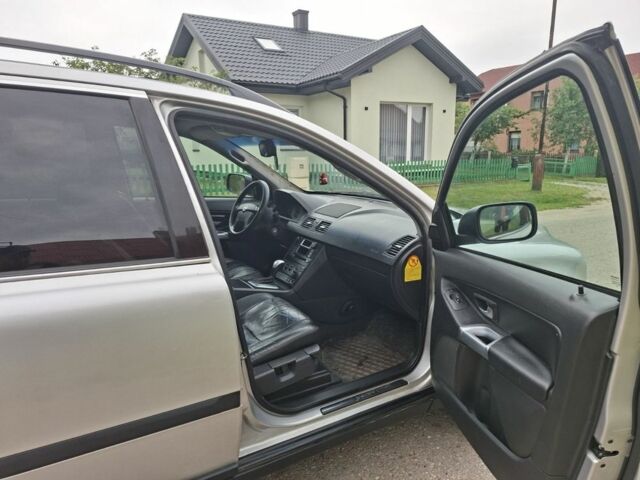 Серый Вольво ХС90, объемом двигателя 2.4 л и пробегом 306 тыс. км за 5750 $, фото 4 на Automoto.ua