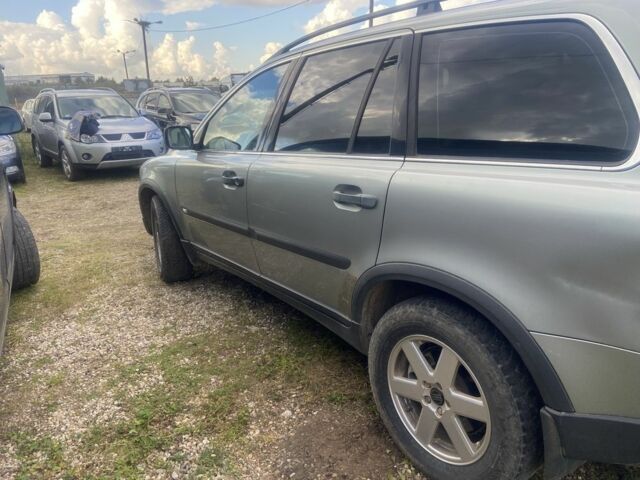 Серый Вольво ХС90, объемом двигателя 2.4 л и пробегом 390 тыс. км за 4557 $, фото 3 на Automoto.ua