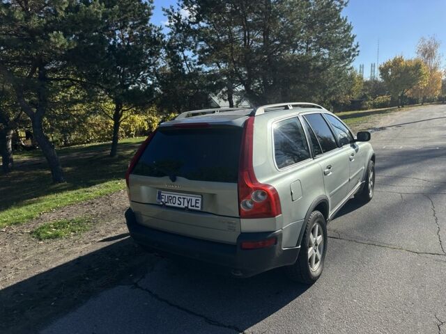 Серый Вольво ХС90, объемом двигателя 2.4 л и пробегом 351 тыс. км за 5100 $, фото 2 на Automoto.ua