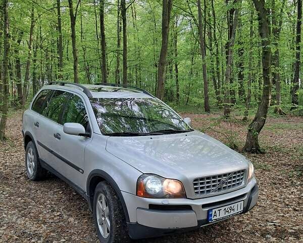 Серый Вольво ХС90, объемом двигателя 2.4 л и пробегом 320 тыс. км за 9400 $, фото 1 на Automoto.ua